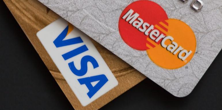 Виза и Мастъркард намаляват таксите за плащания в Европа